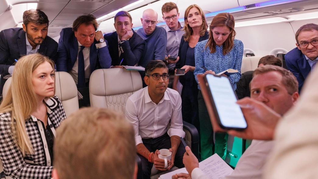 Rishi Sunak holds a media 'huddle' with journalists on the plane on the way to the G20 summit.
