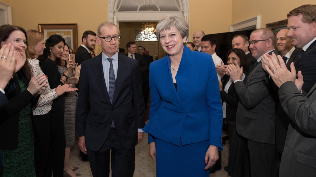 Prime Minister Theresa May and her husband Philip are clapped into 10 Downing Street in by staff after seeing Queen Elizabeth II where she asked to form a new government after winning the 2017 election. 