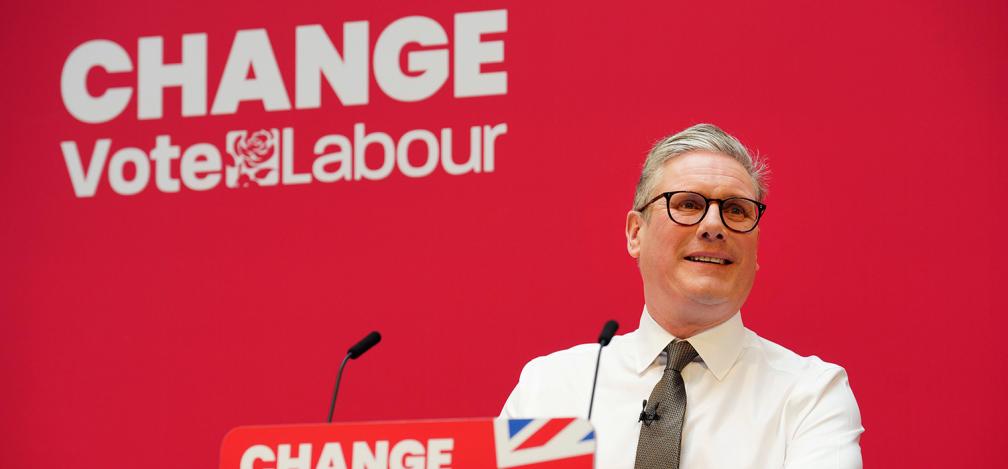 Labour Party leader Keir Starmer speaks on stage at the launch of the party's 2024 general election manifesto in Manchester, England.